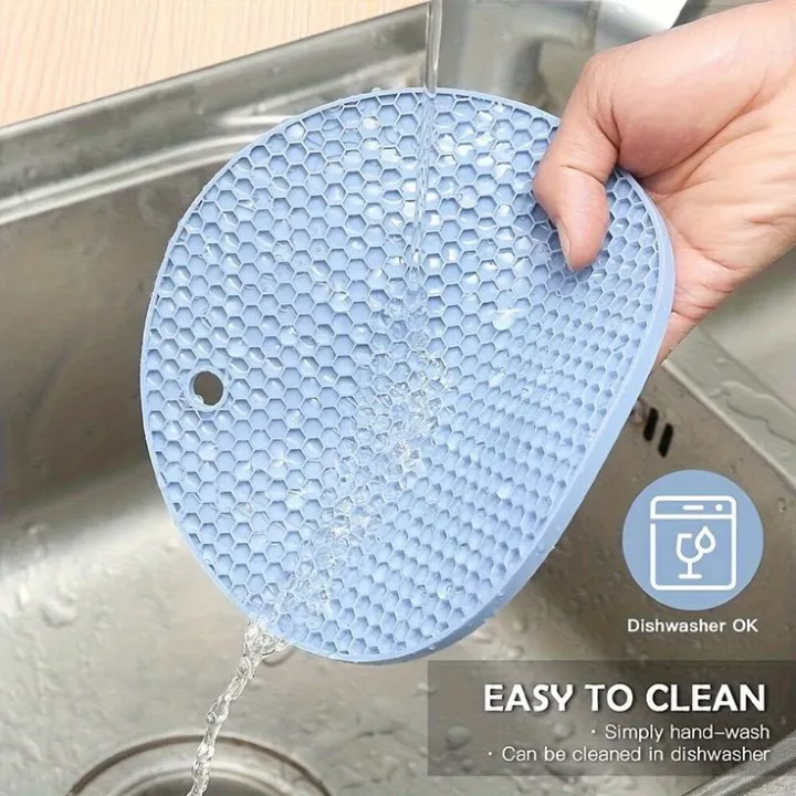 Silicone%20Trivet%20Mat%20%E2%80%93%20Non-Slip%20Pot%20Holder%20%7C%20Round%20Heat%20Resistant%20Silicone%20Mat%20for%20Kitchen%20Dishes%20%7C%20Multi-Function%20Hot%20Pad%20-%20Image%204