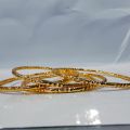 4-Piece Gold Kara Set-Top Picks in Gold-Plated Karas and Bangles for Women and Girls-Gold Karas for Women: Classic and Contemporary Designs-Discover the Beauty of Gold-Plated Kara Sets for Women and Girls-China Gold-Plated Bangles and Karas. 