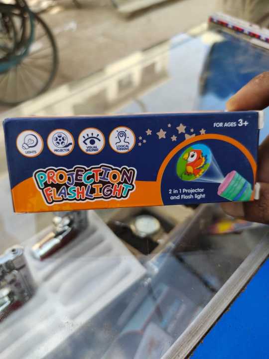 Kids%20Mini%20Doraemon%20Projector%20Camera%20Toy%20For%20Kids/%20Kids%20Cell%20Operated%20LED%20Mini%20Image%20Projector%20Camera%20Easily%20Switch%20Image%20By%20Pressing%20Button/%20LED%20Projector%20Light%20With%2024%20Animal%20Images%20Pattern%20With%203%20Random%20Chips%20Easy%20To%20Carry%20Amazing%20FOR%20bedtime%20Story%20-%20Image%208