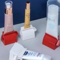 Rolling Tube Toothpaste Squeezer Dispenser Toothpaste Seat Holder Stand. 