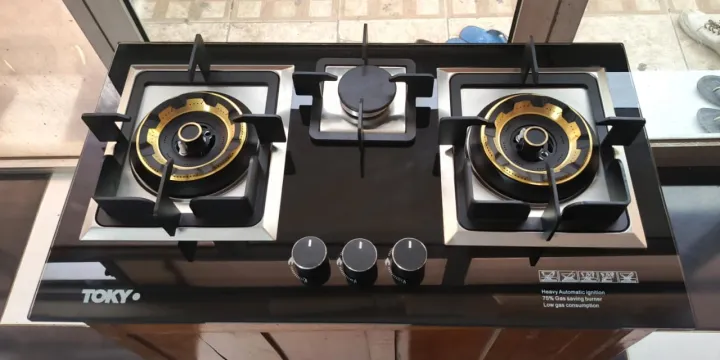 TOKYO%20TK-7G%20Elite%20Brass%20Burner%20Gas%20Hob%20with%20Tempered%20Glass%20&%20Heavy-Duty%20Square%20Shape%20Die-Cast%20Iron%20Grill%20(NG/LPG)%20%E2%80%93%20Auto%20Ignition%20&%201%20Year%20Warranty%20-%20Image%203