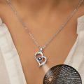 Eternal Affection Stainless Steel Heart Pendant Necklace with 100 Languages I Love You Display. 