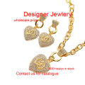 Fashion brand designer jewelry set hollow four-leaf clover stainless steel bracelet gold-plated necklace for women. 
