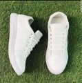 White sneakers, casual stylish sneakers, running shoes, joggers, fashion sneakers. 