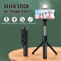 Wireless 4 in 1 Selfie Stick Tripod Stand With Light, Selfie Stick With Mobile Holder With Remote Bluetooth Selfie Stick Tripod Stand Selfie Stick With Bluetooth Shutter Button foldable Extendable 70CM. 