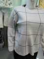 White color sweater for females in woolen material by AAIMAs. 