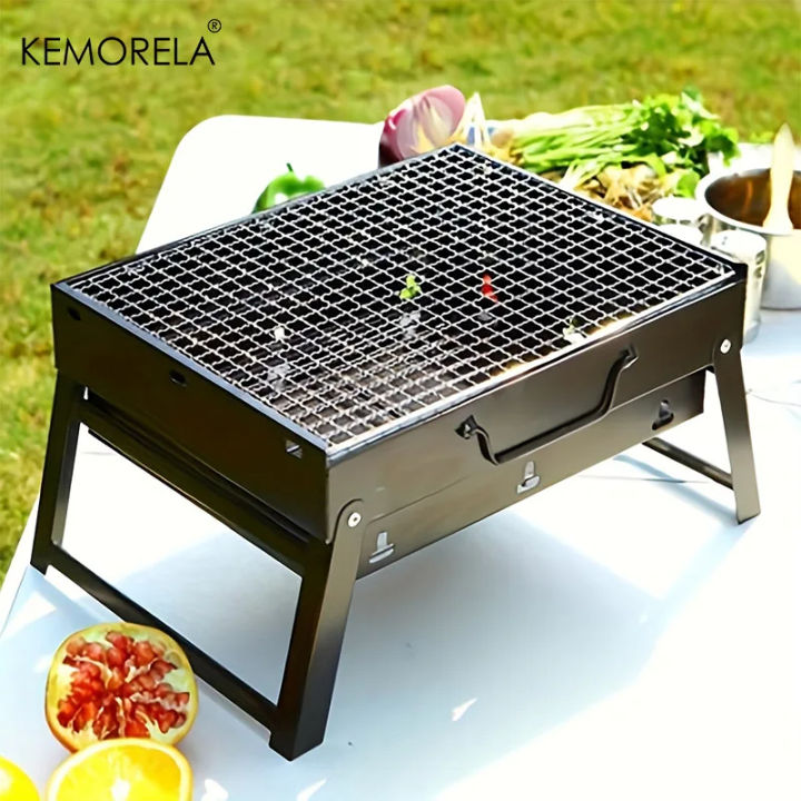 Folding%20Portable%20Charcoal%20Grill%20%E2%80%93%20Stainless%20Steel%20Mini%20BBQ%20Grill%20for%20Outdoor%20Cooking,%20Camping,%20Picnics,%20Beach,%20Tailgating,%20Compact%20&%20Easy%20to%20Carry%20-%20Image%202