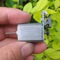 Small 12v dc motor with optical encoder sensor. 