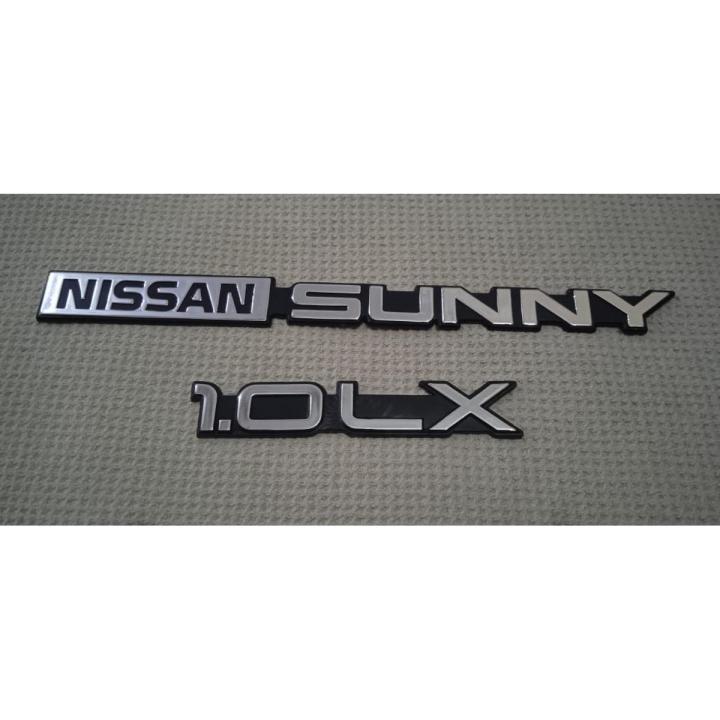 Nissan Sunny 1.OLX 2 Piece Emblem Set