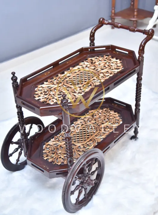 Maharaj%20Hand%20Carved%20Tea%20Trolley-Premium%20Sheesham%20Wooden%20Storage%20Trolley%20With%20Wheels%20Spices%20Rack,%20Coffee,%20Serving,%20Table,Tea%20Cart%20Trolley%20bar%20Cart%20for%20Home%20Kitchen%20Hotel%20Standard%20Size%20Natural%20Teak%20Modern%20Style-Customize%20-%20Image%202