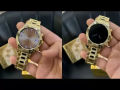 Watch Generation 15 - Smart Watch with Analog and Digital Display, Gold-Toned Bracelet, Touchscreen Interface, and Wireless Charging. 