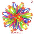 Baby throwing ball stretching shrinking ball sphere toy expanding ball toy. 