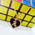 Black and Golden Heart shape Alphabet A Locket for girls and boys. 