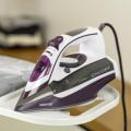 Geepas Steam Iron - 2 in 1 Dry & Steam Iron with Ceramic Soleplate – Adjustable Temperature Control – Dry Ironing, Spray Function & Burst of Steam - 400 ml Water Tank, Anti-Drip, 3000 Watts ( 2 years Warranty ). 