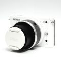 Nikon J1 Mirrorless Camera with 10-30 mm lens - White. 