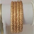 Golden Alloy 4 Piece Bangles. 