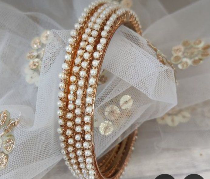 ladies%20bangles%20-Trendy%20pearl%20Bangles%20with%20White%20Pearls/Beads%20churiya%2012%20pcs%20for%20Girls%20and%20Women"%20churiyan%20set%20-%20sizes%202%20or%202.5%20dhai%20-%20Image%204