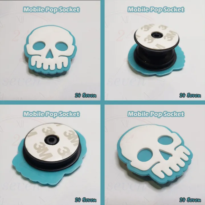 Universal%20Pop%20Socket%20For%20Mobiles%20/%20Tablets%20with%20Pop%20Clip%20(Bracket)%20-%20Skull%20and%20Paw%20-%20Cyan%20and%20Pink%20-%20Image%203