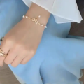 Korean Pearl Bracelet with Charm Crystal Bow For Girls Pearl Link Chain Bow Knot Bracelet Jewelry for Women. 