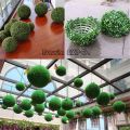 "Vibrant Plastic Artificial Grass Ball: Perfect for Indoor & Outdoor Decor". 