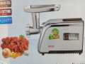 Imported  electric meat machine with vagetable cutter. 