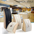 High-end Jewelry display Stylish Solid wood Black Necklace stand Curved design Beige Bracelet holder for Retail stores Home. 