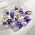 Internet celebrity dithering sound blind TV key chain bag pendant creative floating Kuromi Acrylic oil flowing sand bottle. 