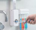 White Automatic Toothpaste Dispenser and Toothbrush Holder Set, Wall Mounted Hands Free Toothpaste Squeezer with 5 Brush Holder, Toothpaste Squeezing Machine. 