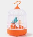 Voice Control Bird Cage Toy – Talking & Singing Electric Mini Parrot with Light & Sound | Hand Sensor Chirping Bird Toy for Kids | Realistic Electronic Birdcage. 