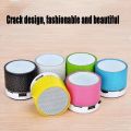 Mini Portable Bluetooth & Rechargeable Speaker with Light + SD Card + USB Supported Multi Color. 