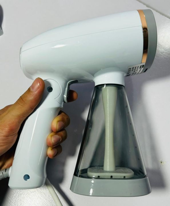 Raf%20Garment%20Foldable%20Handheld%20Clothes%20Steamer%201100w,and%20240ml%20Tank%20Capacity%20Small%20Storage%20Hanging%20Ironing%202%20and%201%20Surging%20Steam,%20Hand%20hanging%20steam%20iron%20ironing%20&%20garment%20steamer%20original,%20Your%20Anywhere,%20Anytime%20Clothes%20Steamer,%20and%20%20Kolax%20/%20Chigo%20-%20Image%204