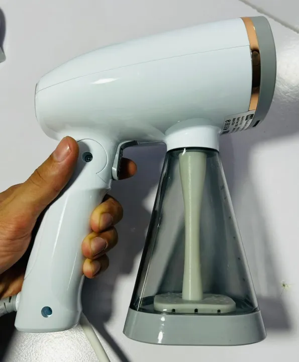 Raf%20Garment%20Foldable%20Handheld%20Clothes%20Steamer%201100w,and%20240ml%20Tank%20Capacity%20Small%20Storage%20Hanging%20Ironing%202%20and%201%20Surging%20Steam,%20Hand%20hanging%20steam%20iron%20ironing%20&%20garment%20steamer%20original,%20Your%20Anywhere,%20Anytime%20Clothes%20Steamer,%20and%20%20Kolax%20/%20Chigo%20-%20Image%204