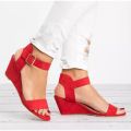 Vibrant Red Sandals with a Buckle Closure that Open at the Toe. 