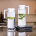 Glass Pitcher 1.1 Liter Jug with Lid Enjoy your favorite beverages featuring a practical lid for easy pouring and storage. Perfect for water, juice, or iced tea, this durable pitcher is an excellent addition to any kitchen. 