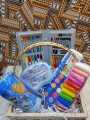 gift basket for kids with lunch box , pencil box , water bottle , stationery kit , colouring kit , caryouns , colours , markers , pencil , eraser , sharpner , glue , play dough  ,sticker , water colours. 