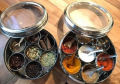 Stainless steel spice box in steel with 7 spice containers with see through lid and one spoon indian spice box steel masala dabba in steel. 