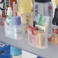 Japanese mini wall-mounted creative refrigerator sauce bag storage box vinegar mustard seasoning bag small plastic organizing box. 