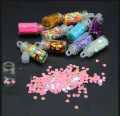 "12 Pcs Glitter Glass Bottle Set for Women - Premium Sparkle for Artificial Eyelashes, Nail Art, and Makeup - Mini Glass Jars with High-Quality Glitter for Eyelash and Nail Decoration - Perfect for Crafting, Fashion, and Party Looks". 