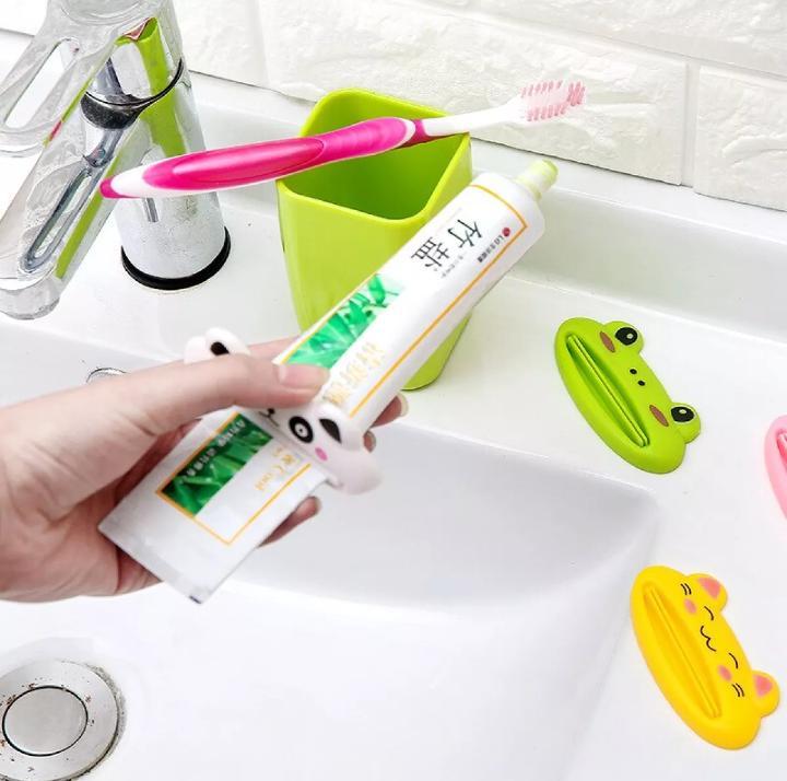Pack of 4 Cartoon Animal Toothpaste Dispenser Plastic Tooth Paste Tube Squeezer Cute Rolling Holder For Tube Bathroom Products