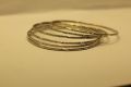 Silver metal bangles for girls Silver metal bangles for women, pack of 12 silver metal bangles for ladies available sizes are 2", 2.25", 2.50". 