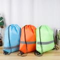 【Factory-direct】 Simple Reflective Stripe Drawstring Gym Backpack 210D Polyester Solid Color Nylon Sports Shoulder Bag Waterproof Portable Fitness Handbag Travel.