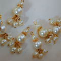 White Color 5 pieces Champane tassel for clothes fancy button. 