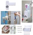 Set of Toothpaste Dispenser & Toothbrush Holder - White Automatic Toothpaste Dispenser and Toothbrush Holder Set  Wall Mounted Toothpaste Dispenser with 5 Toothbrush Holder Set  Toothpaste Squeezing Machine  Toothpaste Dispenser Tooth brush Holder set. 