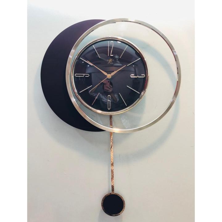 FANCY AND ELEGANT TRANSPARENT GLASS WALL CLOCK ALONG WITH SIDE MOON SHAPE WITH STYLISH LONG PENDULUM  ATTRACTIVE WALL CLOCK STYLISH DESIGN SMOOTH MACHINE WALL CLOCK HANGING WALL CLOCK HOME DECORATION PERFECT FOR YOUR MODERN LIVING ROOM