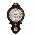 wall clock with pendulumn and hourly sound in best quality. 