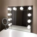 Vanity Lights for Mirror seems Hollywood lights Backlit as Portable LED Bulb Studio Glow for Professional Makeup Stick on Mirror having Dimmable Brightness with 10 Bulbs and 3 Modes White off-white & Warm 12 different color with remote control system. 