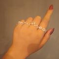 Set of 5 White Beaded Rings. 