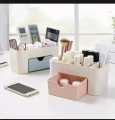 Cosmetics storage box, table organizer, vanity box with makeup, and dressing table stand. 