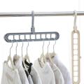 CLICKANDBUY Portable Rotated 360º 9-Hole Non Slip Clothes Hanger，Movable Hook Multifunctional Hanger Wardrobe Storage Shelf Clothes Drying Rack Hanging Coat Household. 