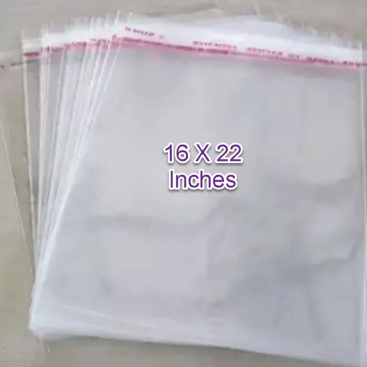 Pack%20of%2025%20Tape%20Bags%2016%20X%2022%20Inches%20Clothes%20packing%20transparent%20plastic%20cellophane%20magic%20sticky%20tape%20paper%20stick%20resealable%20bags,%20Packing%20Material%20plastic%20bags%20-%20Image%202